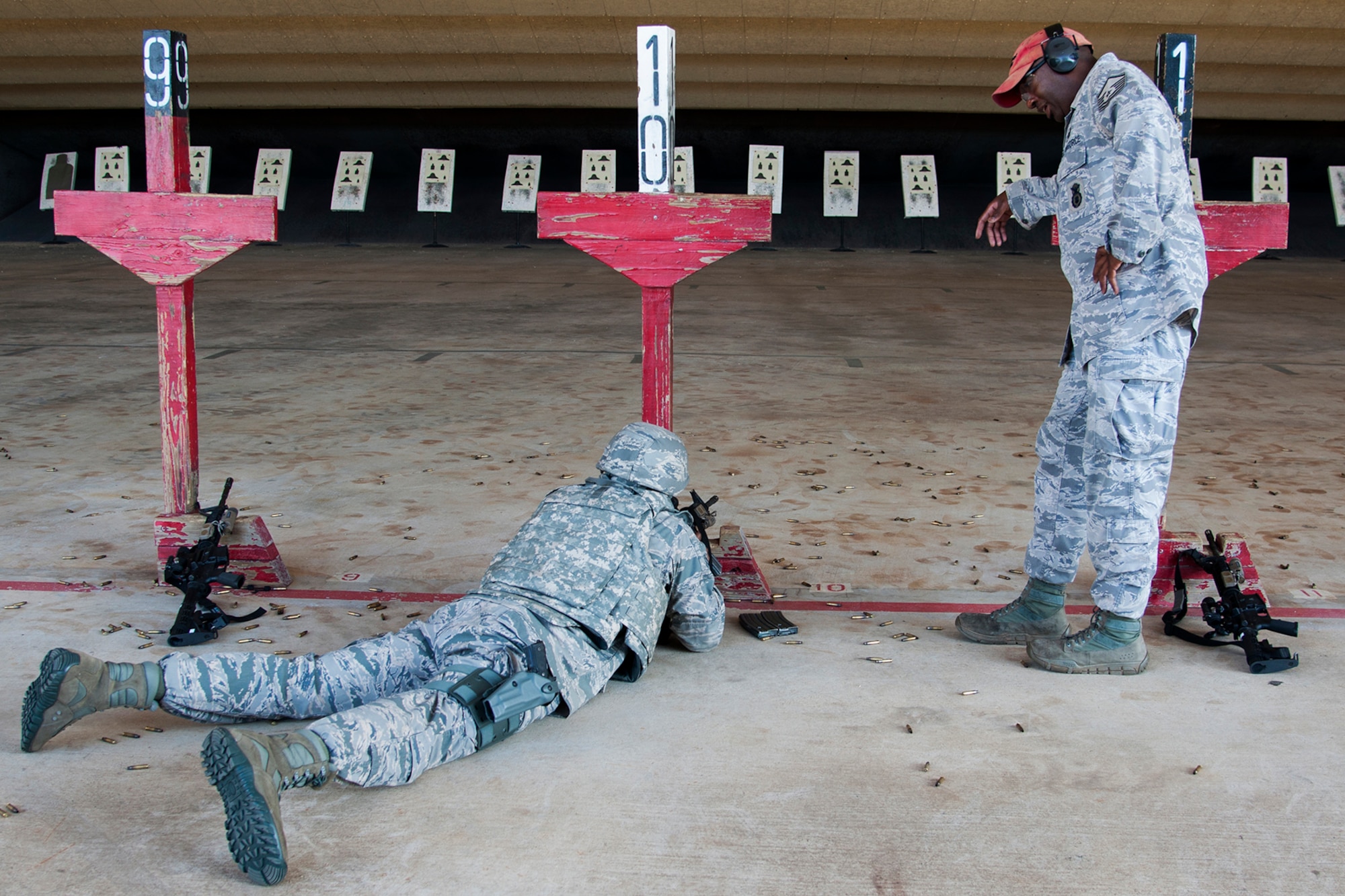 A member of the 307th Security Forces Squadron fires from the prone position during weapons qualification training prior to deploying to support an Eager Lion exercise, May 17, 2014, Barksdale Air Force Base, La. The exercise, which takes place in Jordan, involves scenarios ranging from training for a humanitarian assistance to practicing integrated air and missile defense. (U.S. Air Force photo by 2nd Lt. Monique Roux/Released)