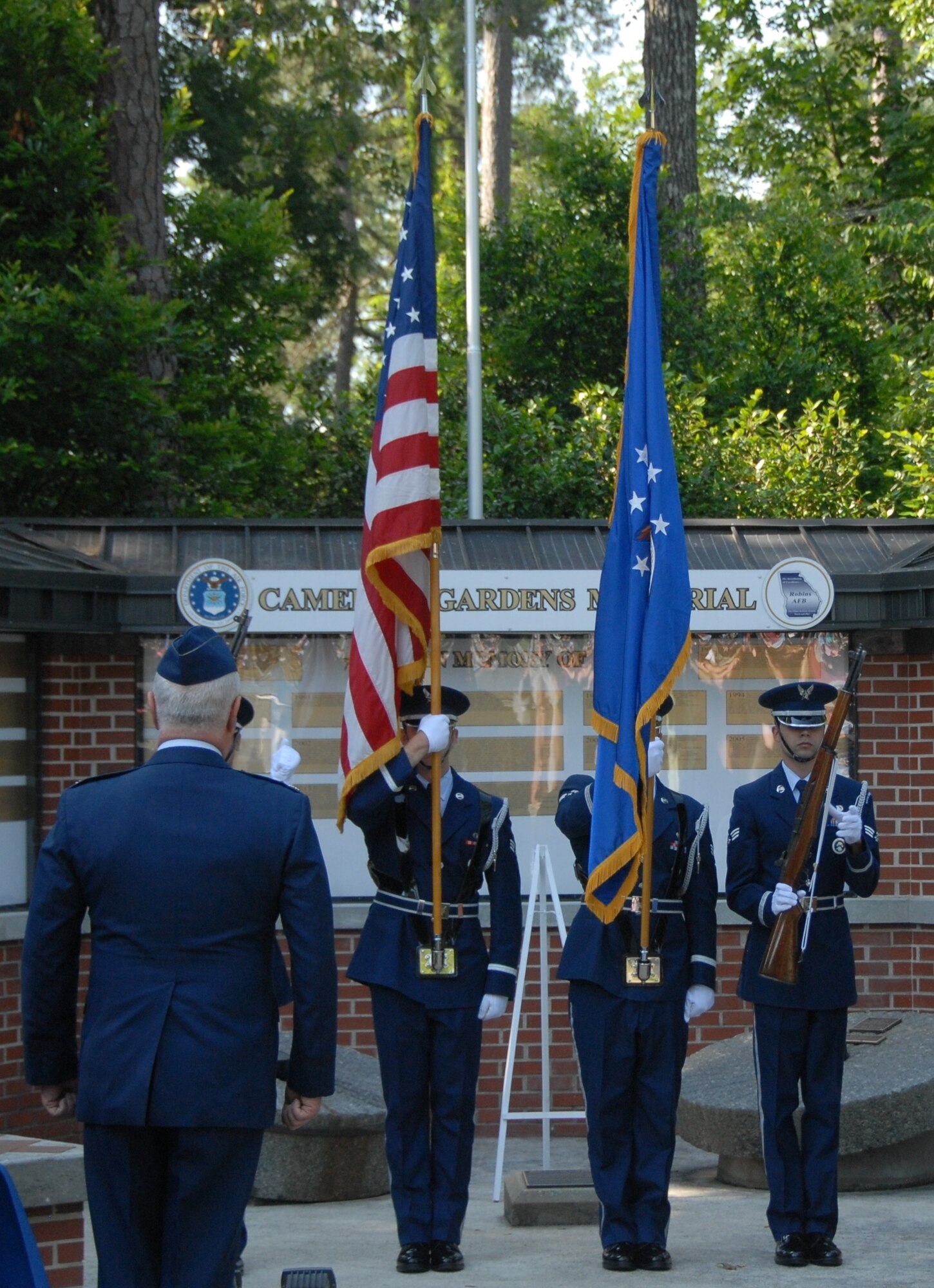 The presentation of the colors began the Camellia Gardens Memorial Service Thursday, May 22.  The ceremony marked the 38th year of the event.  (U.S. Air Force photo by Misuzu Allen)