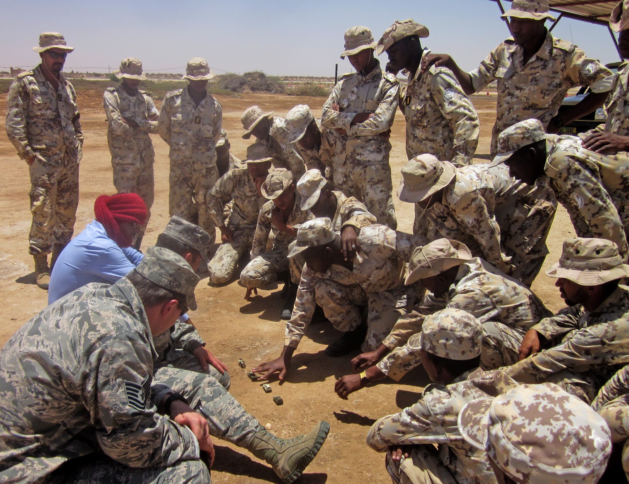 NOUAKCHOTT AIR BASE, Mauritania -- 818th Mobility Support Advisory Squadron air advisors advise Mauritanian Airmen on convoy tactics at Nouakchott Air Base, Nouakchott, Mauritania, April 27, 2014. (Courtesy photo)