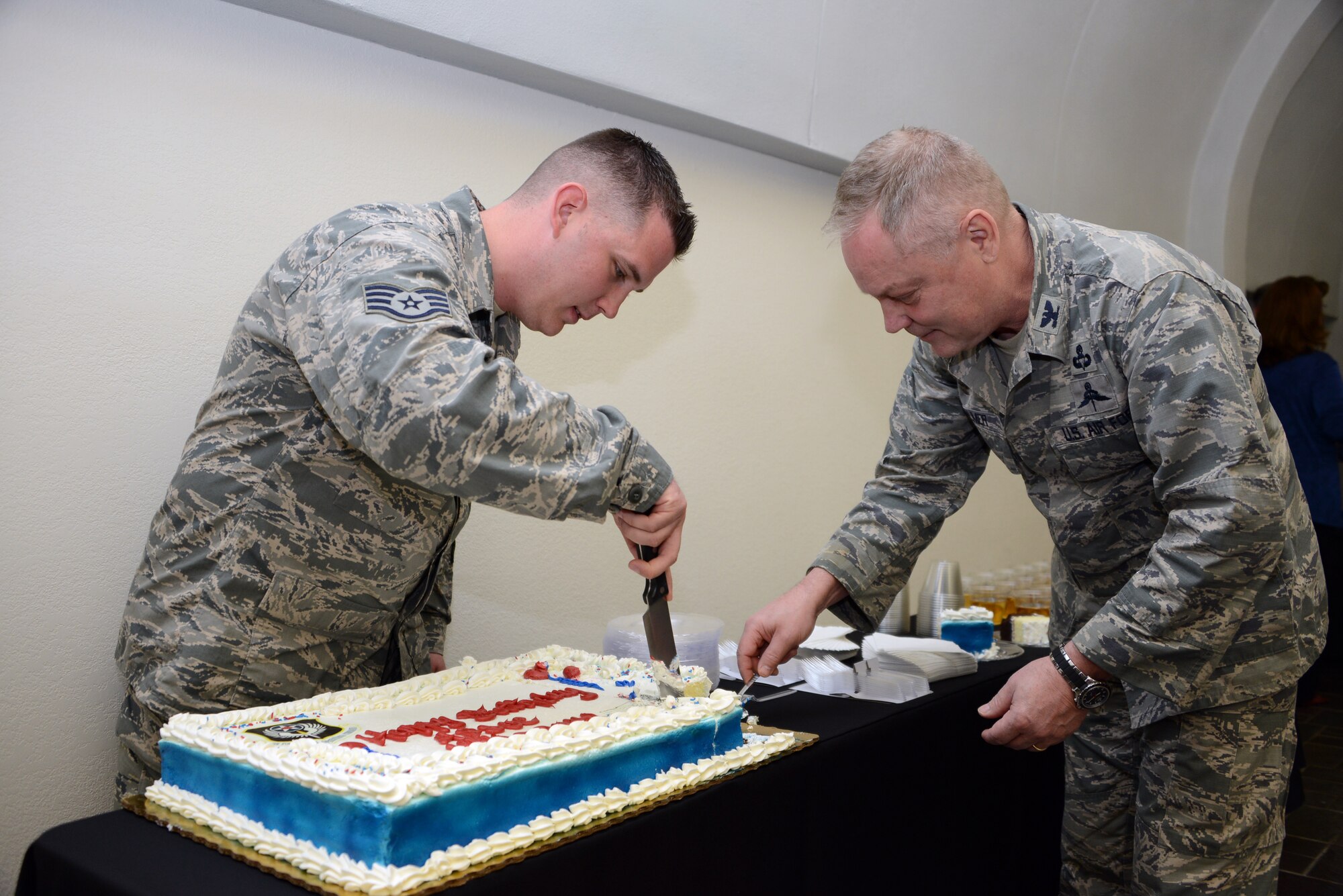 Staff Sgt. Michael Inman and Col. Glenn Palmer celebrate the Air Force Special Operations Command's 24th Birthday on May 22, 2014. (U.S. Air Force photo by SSgt Erica Horner)