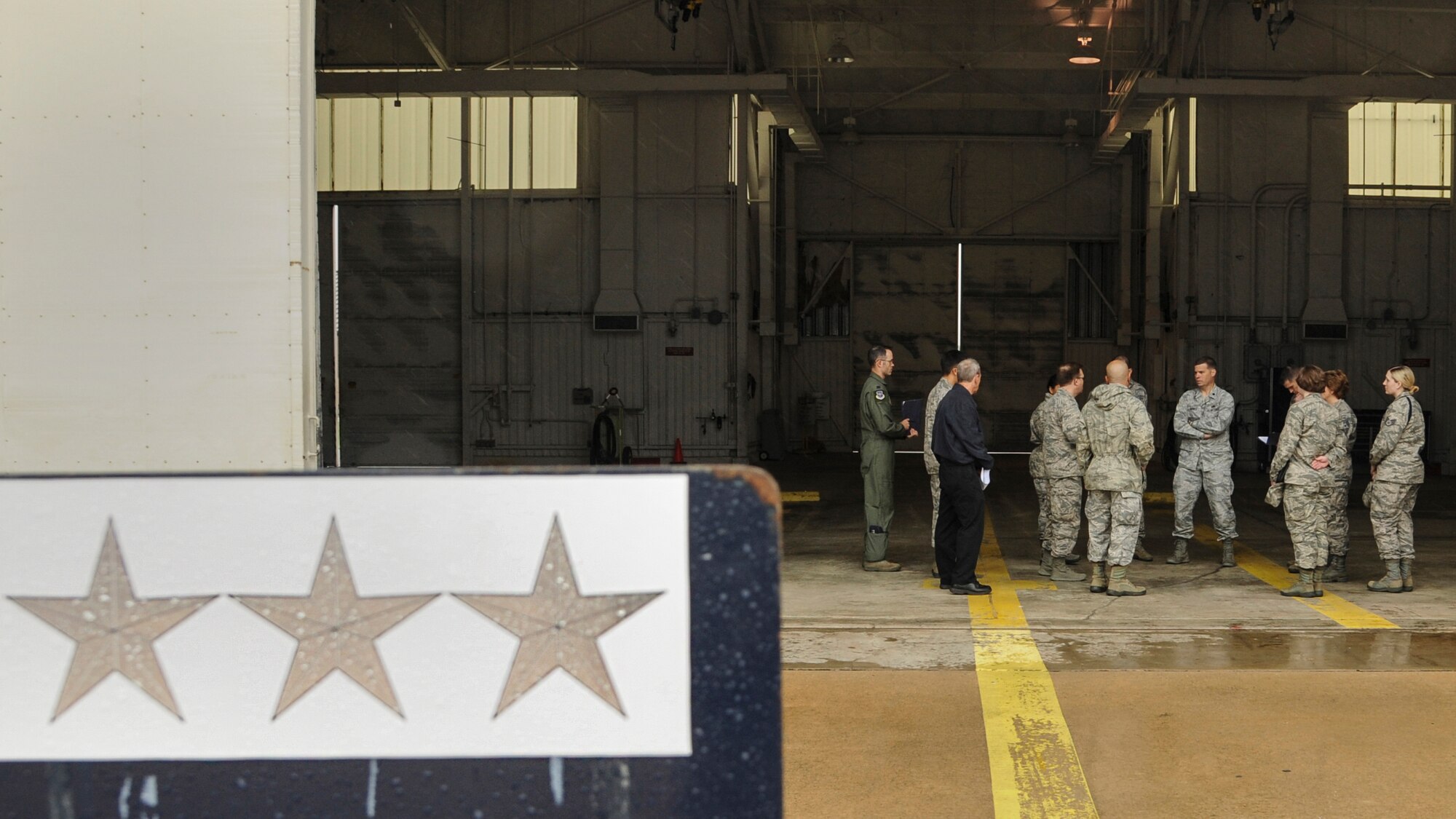 Team Little Rock Airmen prepare for a visit from Lt. Gen. Brooks Bash, Air Mobility Command vice commander, May 14, 2014, at the 19th Component Maintenance Squadron at Little Rock Air Force Base, Ark. Protocol works closely with base leadership in organizing events such as change of commands, retirement ceremonies and distinguished visitor tours. (U.S. Air Force photo by Airman 1st Class Harry Brexel)