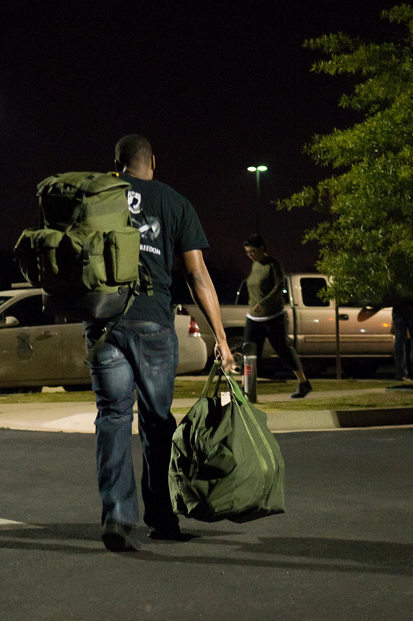 A member of the 307th Security Forces Squadron prepares to deploy in support of an Eager Lion exercise, May 19, 2014, Barksdale Air Force Base, La. The exercise, which takes place in Jordan, involves scenarios ranging from training for a humanitarian assistance to practicing integrated air and missile defense. (U.S. Air Force photo by Master Sgt. Greg Steele/Released)