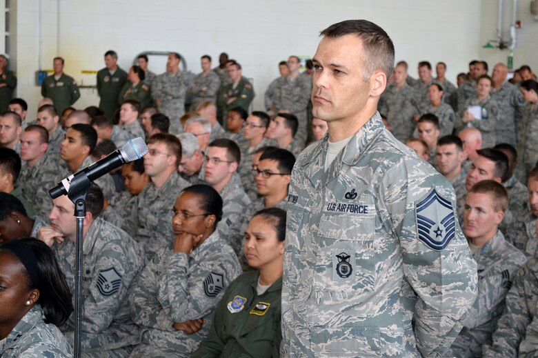 Senior Master Sgt. Walter Bennett, 440th Security Forces Squadron superintendent, asks Secretary of the Air Force Deborah Lee James a question during James' "all call" with Pope Airmen on May 19. James received mission briefings from Pope commanders, toured facilities, and had lunch with Airmen during her one-day visit. (U.S. Air Force photo/Marvin Krause)