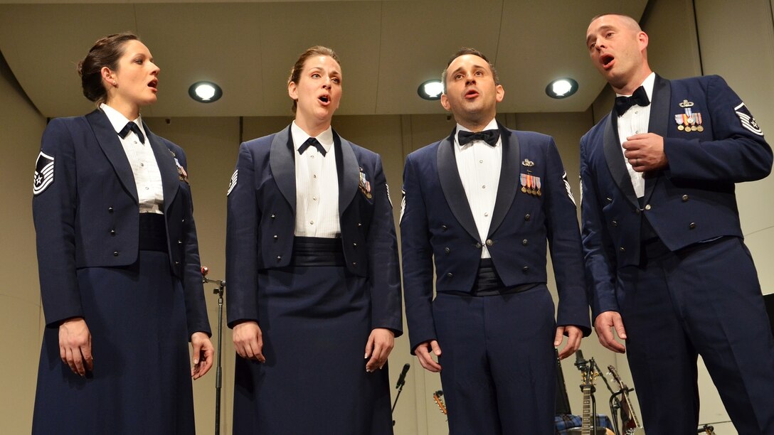 (From left) Master Sgt. Emily Wellington, Technical Sgt. Julia Brundage, Master Sgt. Joe Haughton, and Master Sgt. Eric Sullivan are the founding members of Celtic Aire. Formed in 2007, they deployed in 2009 to Kuwait, Iraq, Qatar, and Kyrgyzstan in support of Operation Enduring Freedom. On their first national tour, they will travel to Pennsylvania, Ohio, Indiana, and Illinois.  (U.S. Air Force photo by Senior Master Sgt. Bob Kamholz/released)