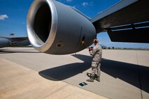 Senior Airman Anthony L. Caramiello, 108th Wing Maintenance Squadron, New Jersey Air National Guard, checks the engine oil on a KC-135R Stratotanker May 20, 2014, at Joint Base McGuire-Dix-Lakehurst, N.J. (U.S. Air National Guard photo by Master Sgt. Mark C. Olsen/Released)
