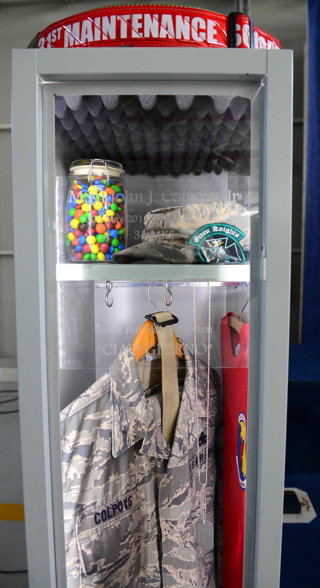 Master Sgt. John Colpoys Jr.’s belongings are displayed during a memorial service, May 22, 2014, at Aviano Air Base, Italy. Colpoys was a 31st Maintenance Squadron transient alert technician who passed away in a motorcycle mishap in Budoia, Italy, on May 14. (U.S. Air Force photo/Airman 1st Class Ryan Conroy)