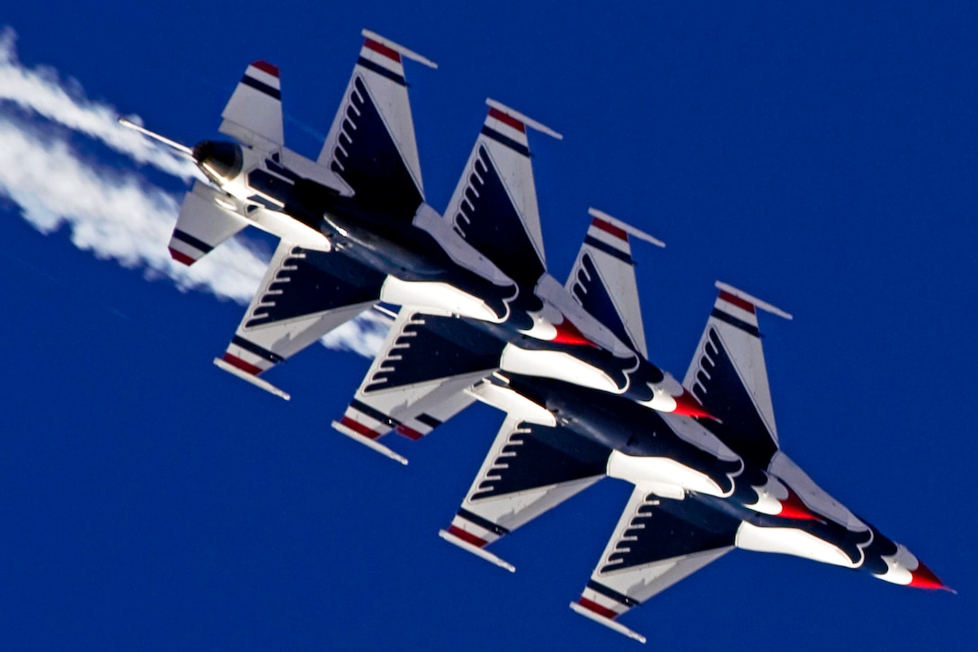 The United States Air Force Air Demonstration Squadron, Thunderbirds, move from trail position into diamond formation during Aviation Nation 2012 over Nellis Air Force Base, Nev., Nov. 11, 2012. Aviation Nation celebrates 71 years of airpower in Las Vegas and the Air Force's accomplishments in air, space and cyberspace.  
