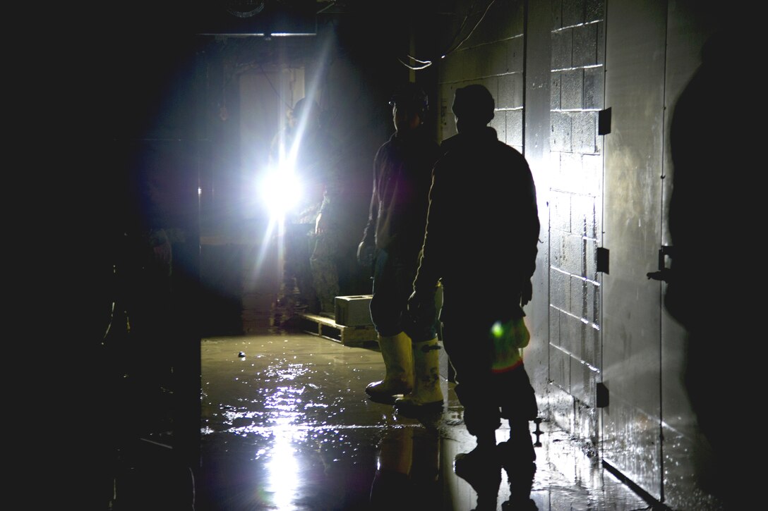 Sailors prepare to pump out the lower levels of the World Trade Center in New York, Nov. 4, 2012. The sailors are assigned to Mobile Diving and Salvage Unit 2.  
