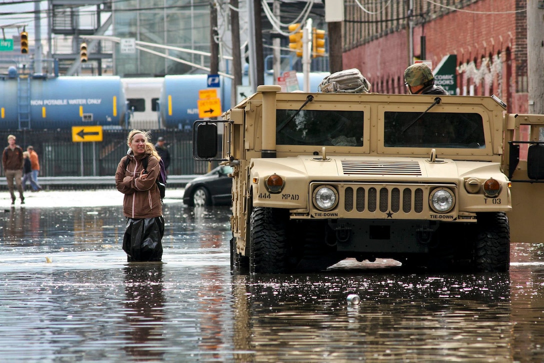 Soldiers assist residents displaced by Hurricane Sandy in Hoboken, N.J., Oct. 31, 2012. The soldiers are assigned to the New Jersey National Guard.  
