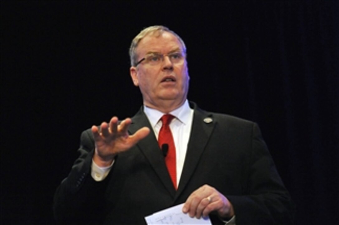 Deputy Defense Secretary Bob Work delivers remarks and takes questions from participants at the Aerospace Industries Association meeting in Williamsburg, Va., May 22, 2014, 2014.