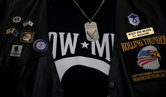 Rob Wilkins displays pins and his former Air Force rank on his Rolling Thunder motorcycle vest May 15, 2014, at his office in Leesburg, Va. Wilkins is part of the board of directors of Rolling Thunder, the annual Memorial Day motorcycle rally through Washington, D.C. (U.S. Air Force photo/Senior Airman Alexander W. Riedel)
