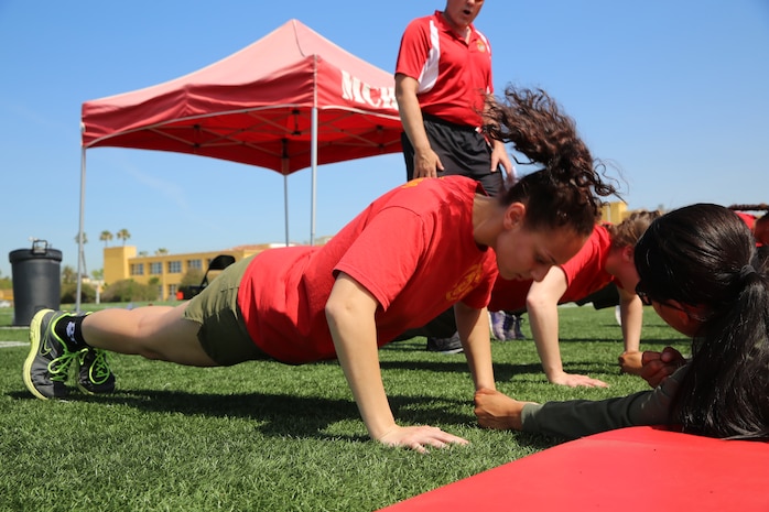 Lauren Hess performs push-ups during The National High School Physical Fitness Championships aboard Marine Corps Recruit Depot San Diego, May 16-17. The event consisted of each team performing sit-ups, push-ups, five long jumps, pulls ups and a shuttle run.