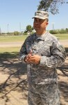 Arizona Army National Guard Staff Sgt. Marcos Moreno, 1/285th Regional Training Institute, explains his plan to rename Sunnyside Park in Tucson in honor of Command Sgt. Maj. Martin Barreras, who died during military operations in Afghanistan. Barreras was a 1983 graduate of Sunnyside High School located next to the park.