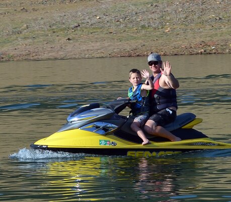 Safe-boating buddies head out on their personal watercraft at Pine Flat Lake near Piedra, Calif., May 3, 2014. 