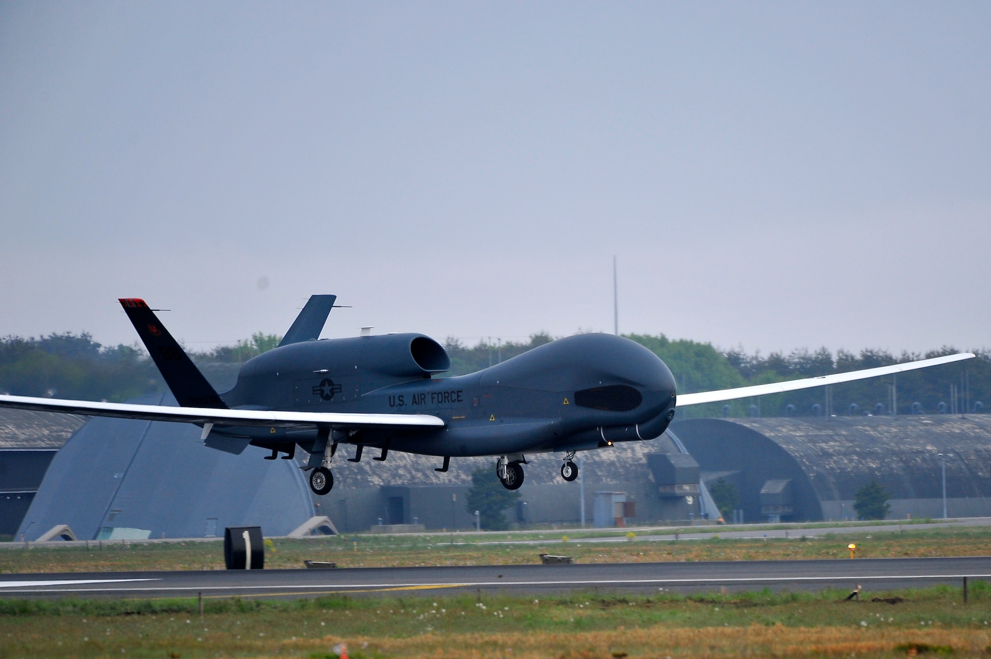 An RQ-4 Global Hawk from Andersen Air Force Base, Guam lands at Misawa Air Base, Japan, May 24, 2014. The aircraft is part of the 69th Reconnaissance Group Detachment 1 and is the first Global Hawk to land in Japanese territory. (U.S. Air Force photo/Staff Sgt. Nathan Lipscomb)