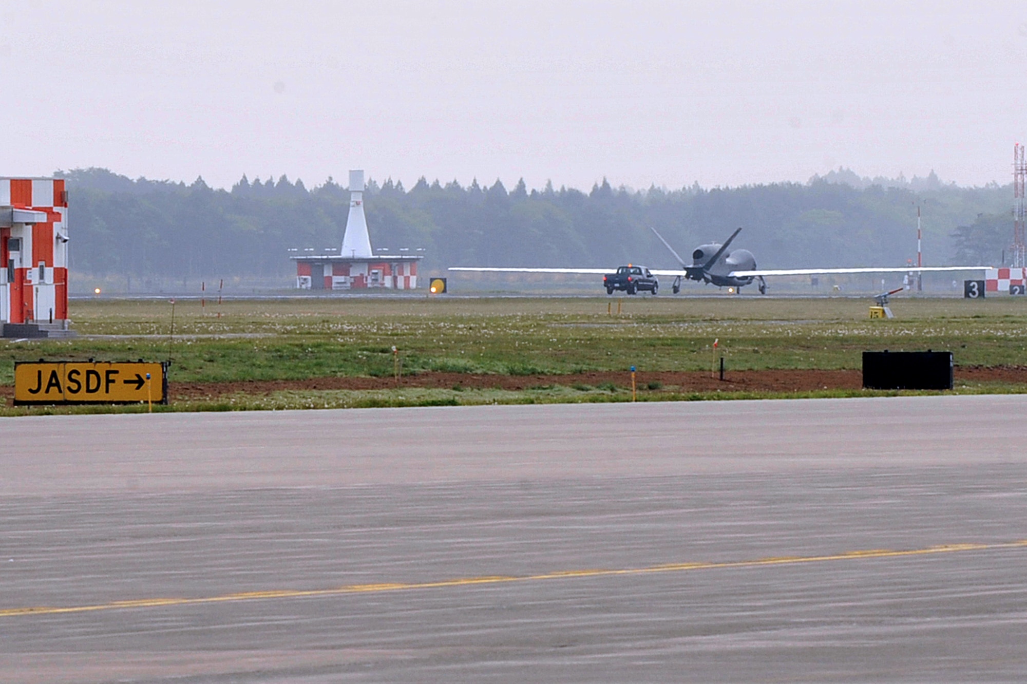 For the first time a RQ-4 Global Hawk taxis down the runway at Misawa Air Base, Japan, May 24, 2014. The Global Hawk can provide near real-time aerial imagery reconnaissance support to U.S. and partner nations assisting in disaster relief effort. The aircraft’s persistence in its ability to fly more than 30 hours at a time provided coverage of upward of 100,000 kilometers of the disaster area within 24 hours. This was essential in supporting relief efforts of Operation Damayan during 2013’s Super Typhoon Haiyan in the Philippines. (U.S. Air Force Photo/ Staff Sgt. Tong Duong)