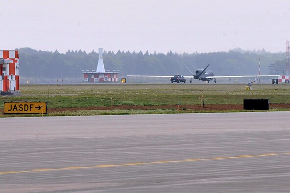 For the first time a RQ-4 Global Hawk taxis down the runway at Misawa Air Base, Japan, May 24, 2014. The Global Hawk can provide near real-time aerial imagery reconnaissance support to U.S. and partner nations assisting in disaster relief effort. The aircraft’s persistence in its ability to fly more than 30 hours at a time provided coverage of upward of 100,000 kilometers of the disaster area within 24 hours. This was essential in supporting relief efforts of Operation Damayan during 2013’s Super Typhoon Haiyan in the Philippines. (U.S. Air Force Photo/ Staff Sgt. Tong Duong)