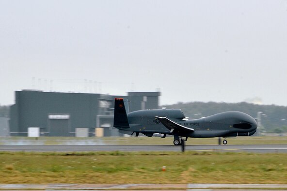 The first RQ-4 Global Hawk from Andersen Air Force Base, Guam to land in Japanese territory arrives at Misawa Air Base, Japan, May 24, 2014. More than three dozen maintenance, support and operations personnel from the 69th Reconnaissance Group Detachment 1 are temporarily assigned here in support of the Global Hawk mission through October. (U.S. Air Force Photo/ Staff Sgt. Tong Duong)