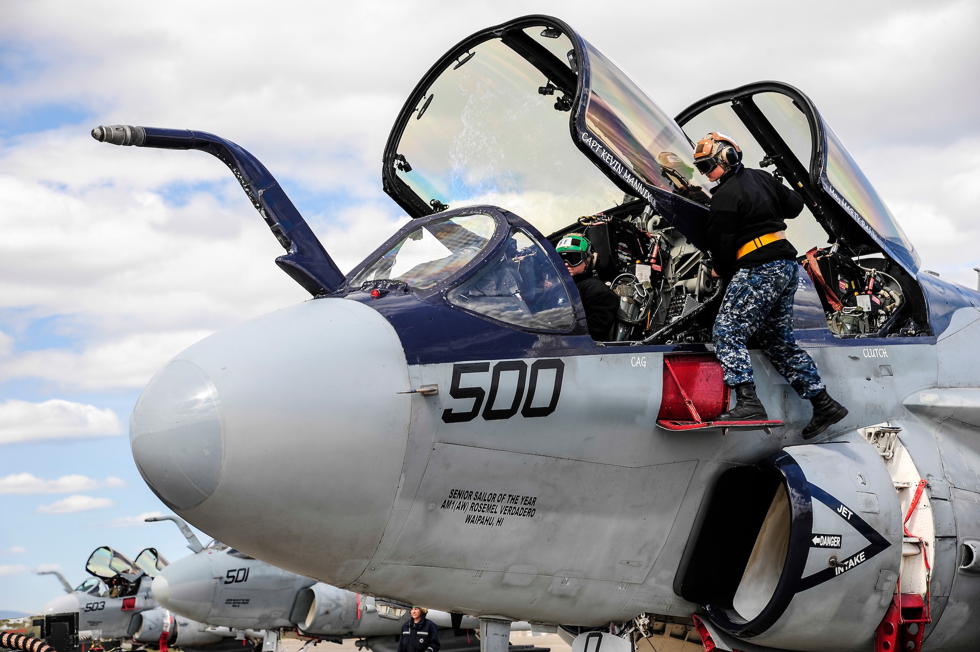 U.S. Navy EA-6B Prowler crew chiefs from the Electronic Attack Squadron 142, Naval Air Station Whidbey Island, Oak Harbor, Wash., perform preflight procedures May 22, 2014, Eielson Air Force Base, Alaska. Sailors are here at Eielson to attend RED FLAG-Alaska 14-1, a Pacific Air Forces-directed field-training exercise for U.S. and coalition forces. (U.S. Air Force photo by Senior Airman Zachary Perras/Released)
