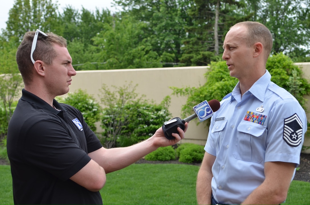 Senior Master Sgt. Dennis Hoffmann is interviewed by a reporter from WLFI, Lafayette, Ind. (U.S. Air Force photo by Senior Master Sgt. Bob Kamholz/released)