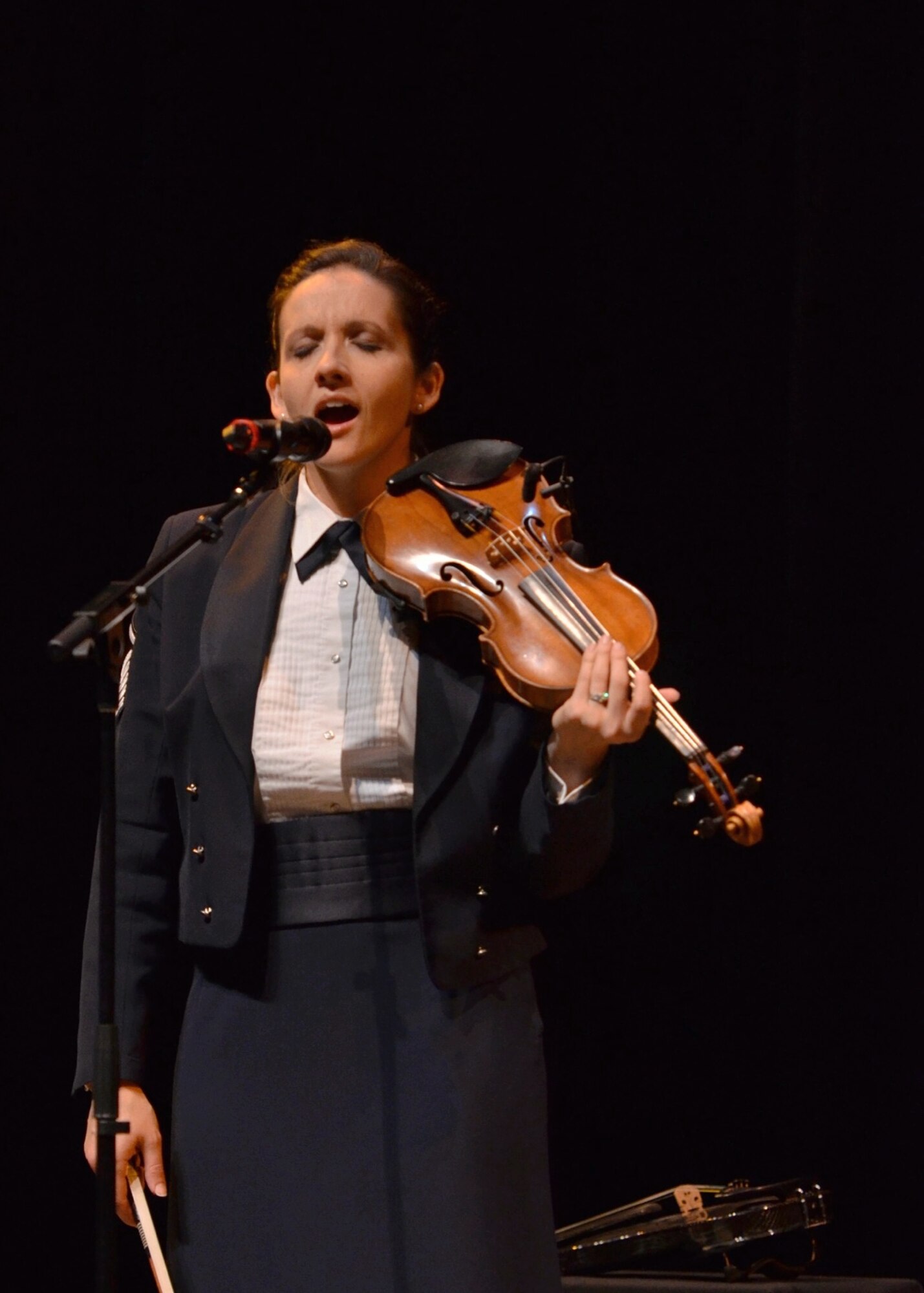 Alto vocalist and violinist, Master Sgt. Emily Wellington, sings a ballad at the Cincinnati, Ohio performance at Jarson-Kaplan Theater, Aronoff Center.  (U.S. Air Force photo by Senior Master Sgt. Bob Kamholz/released)