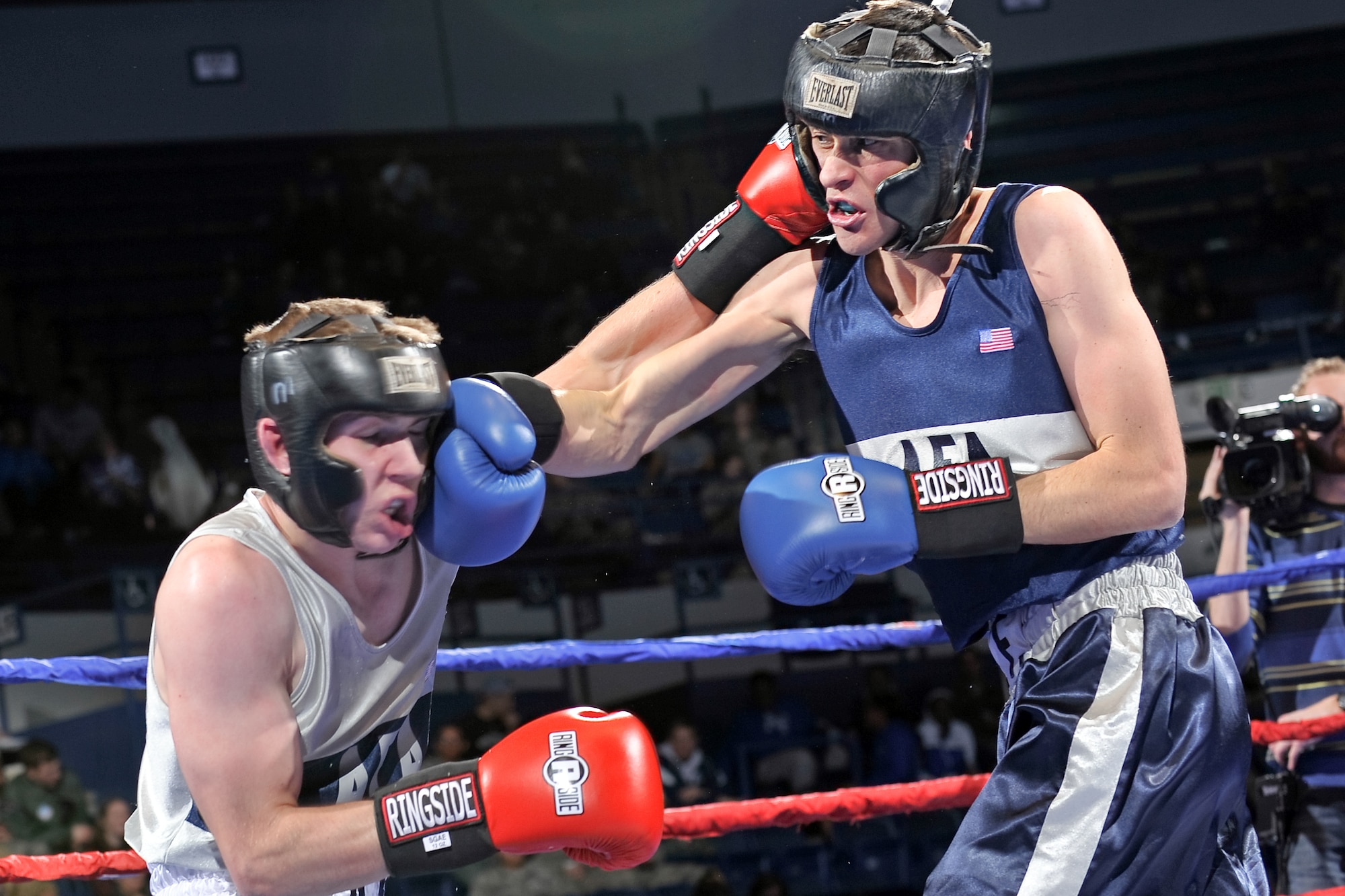 Academy cadets compete against each other during the annual Wing Open boxing competition. Competing is one of the eight pillars of the Essence of USAFA, which allows cadets to enhance their determination, demands commitment and teaches life lessons that will build skills and resiliency while shaping cadets into more capable leaders. (U.S. Air Force Photo/Liz Copan)