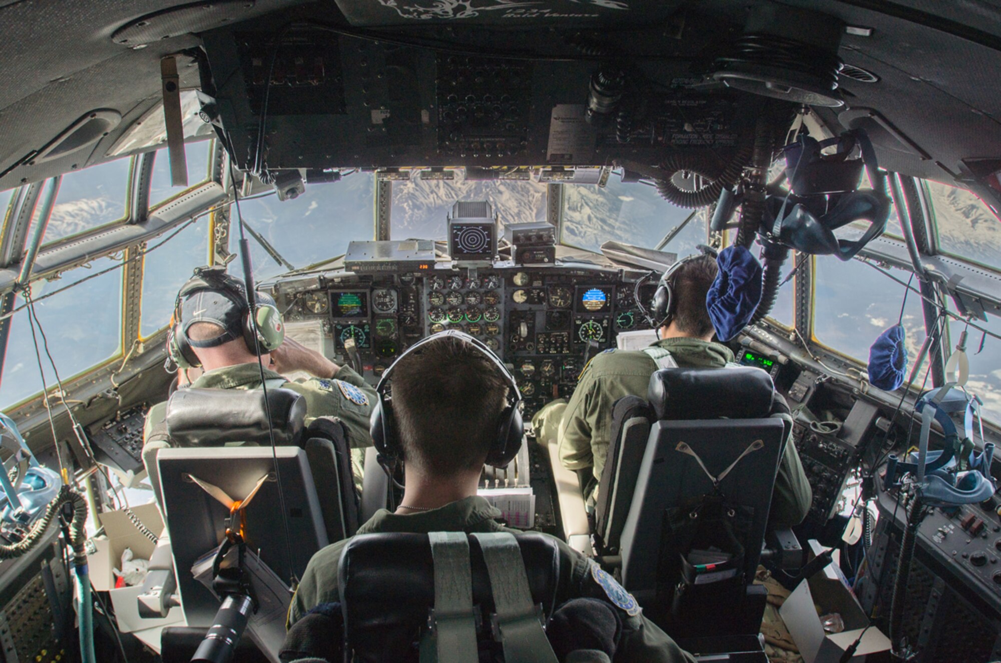 A 165th Airlift Squadron aircrew flies a Kentucky Air National Guard C-130 Hercules over the mountains of Alaska during a training scenario as part of Red Flag-Alaska on May 13, 2014. 165th AS aircrew are receiving a lot of great training while participating in Red Flag-Alaska. (U.S. Air National Guard photo by Master Sgt. Phil Speck)
