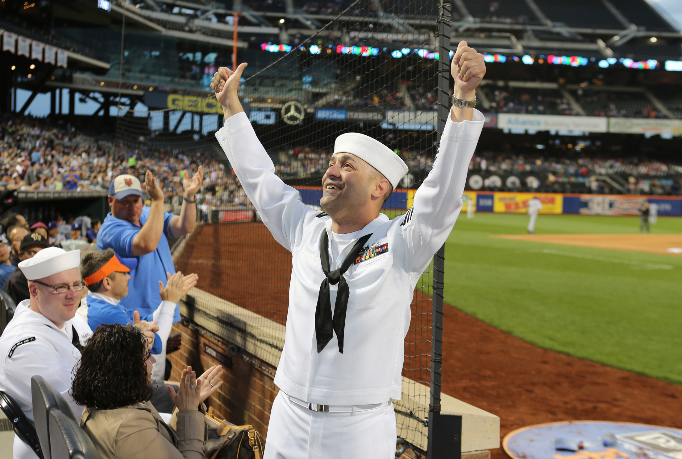 Navy Petty Officer 1st Class Anthony Costa gives a thumbsup to the