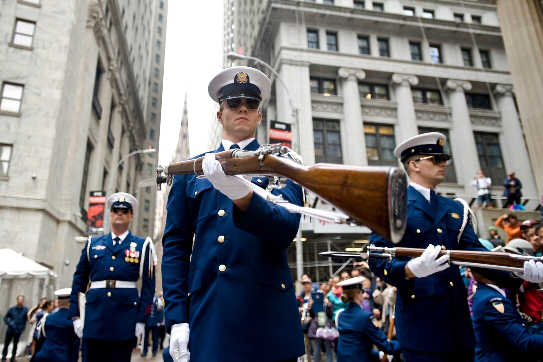 A member of the Coast Guard Ceremonial Honor Guard silent drill team
