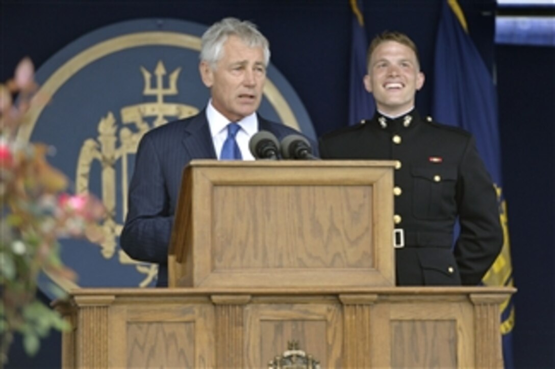 Defense Secretary Chuck Hagel delivers the final remarks as the graduation and commissioning ceremony concludes at the U.S. Naval Academy in Annapolis, Md., May 23, 2014. 