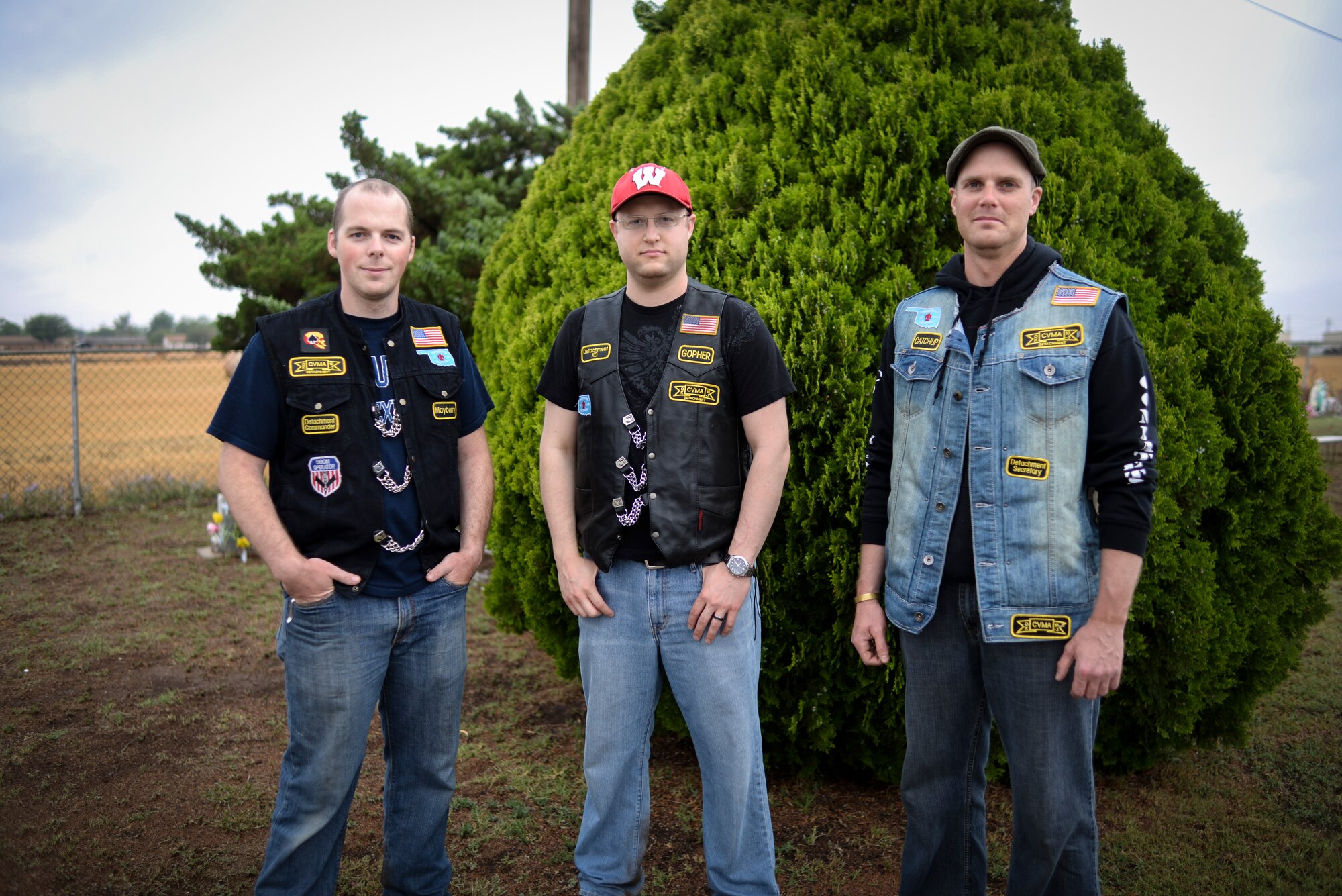 ALTUS, Okla. – U.S. Airmen from the 54th Air Refueling Squadron stand together after placing U.S. flags next to the tombstones of deceased U.S. service members at the Altus City Cemetery, May 24, 2014. The Airmen placed flags as part of the Memorial Day weekend, which remembers the sacrifices of service members throughout U.S. history. (U.S. Air Force photo by Staff Sgt. Nathanael Callon/Released) 