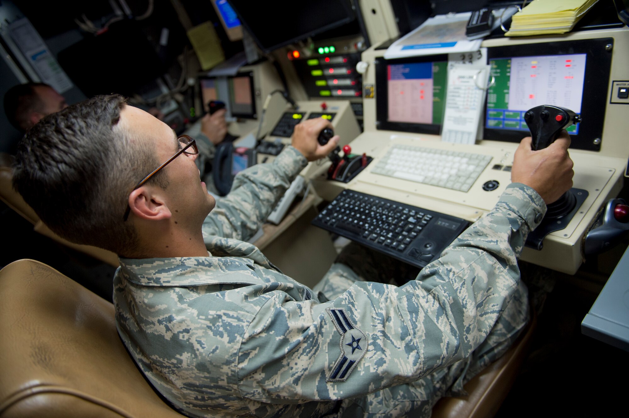Members of the 386th Expeditionary Civil Engineering Squadron took part in the Operations Group’s Aircrew for a Day program, May 16, 2014. During the event, non-flying military members were given tours of aircraft facilities, three separate planes, and were also briefed by operations personnel on the activities that aircrew members go through on a daily basis. The tours included the 46th Expeditionary Reconnaissance Squadron, C-130 operations from the 386th Expeditionary Operations Group and Apache helicopters from the Army’s flying unit here. (U.S. Air Force photo by Staff Sgt. Jeremy Bowcock)