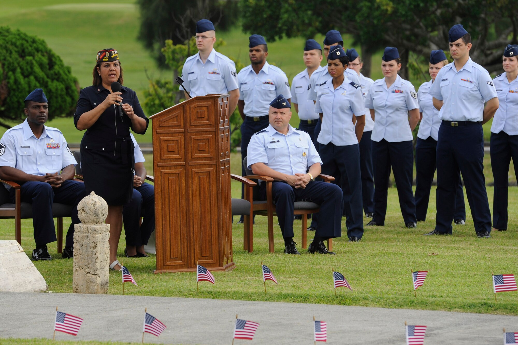 Retired U.S. Army Command Sergeant Major Jackeline Fountain gives a speech during a Memorial Day ceremony on Kadena Air Base, Japan, May 26, 2014. Fountain talked about the importance of remembering our fallen comrades and showing support on Memorial Day, not because it is a duty but because they deserve our remembrance. (U.S. Air Force photo by Senior Airman Marcus Morris)