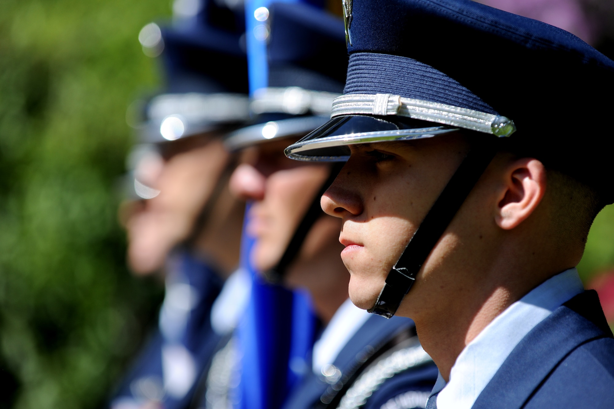 Airmen from the 422nd Air Base Group Honor Guard prepare to post the colors during a Memorial Day ceremony at the Brookwood American Military Cemetery, United Kingdom, May 25, 2014. Brookwood serves as the final resting place for 468 American service members who gave their lives during World War I. (U.S. Air Force photo by Staff Sgt. Jarad A. Denton/Released)
