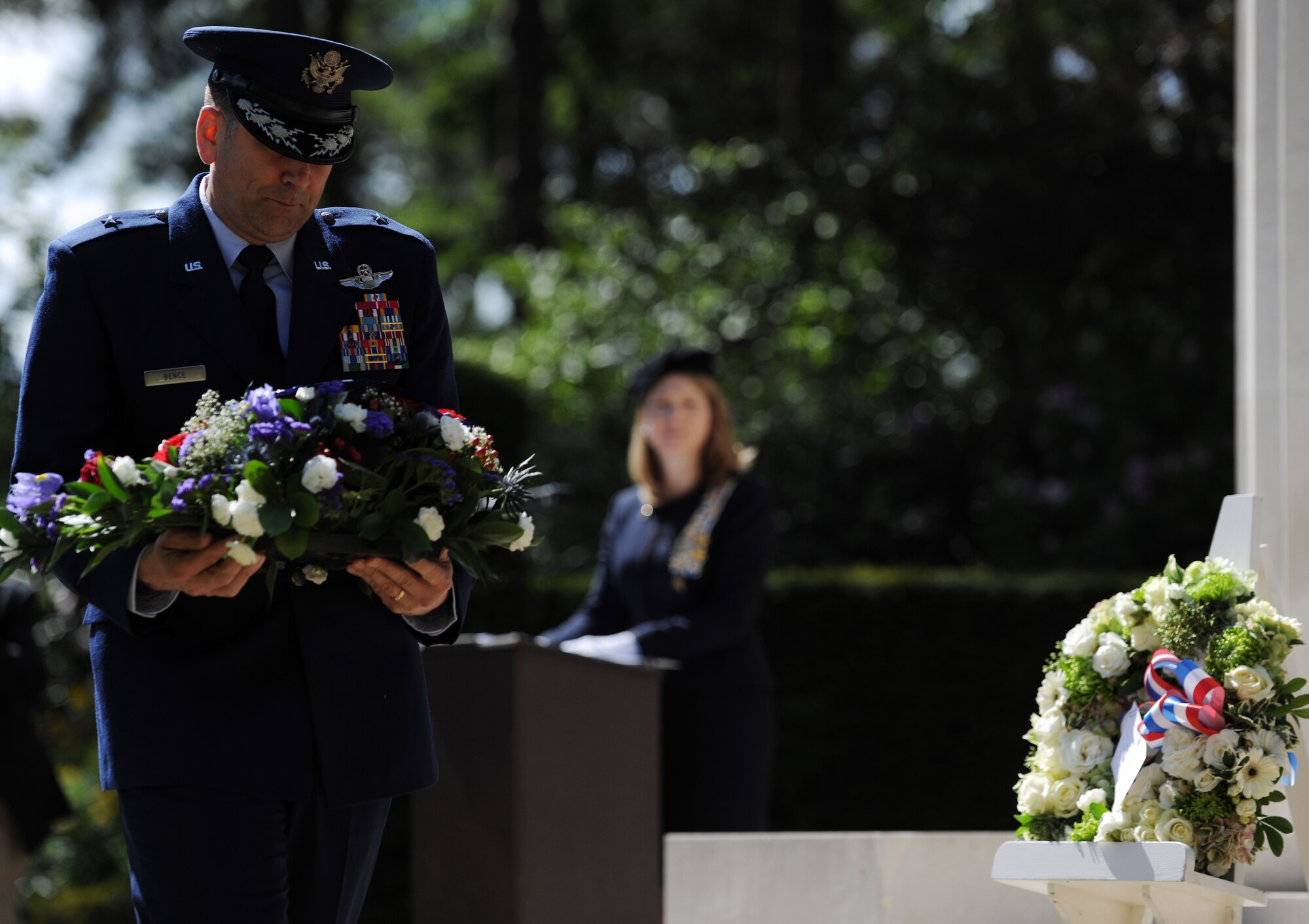 U.S. Air Force Brig. Gen. Christopher Bence, 3rd Air Force vice commander, prepares to lay a memorial wreath on the steps of the Chapel at the Brookwood American Military Cemetery, United Kingdom, May 25, 2014. The Chapel bears the names of 563 World War I U.S. service members whose remains have yet to be recovered. (U.S. Air Force photo by Staff Sgt. Jarad A. Denton/Released)