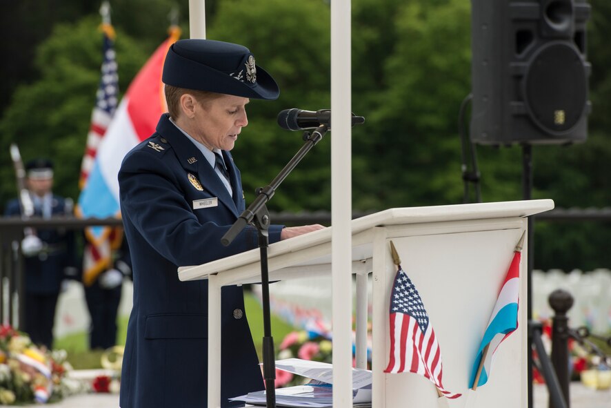 U.S. Air Force Col. Cherri Wheeler, U.S. Air Forces in Europe command chaplain, recites a prayer during a Memorial Day ceremony at the Luxembourg-American Military Cemetery and Memorial, Luxembourg, May 24, 2014. Through relationships with partner countries, U.S. Air Forces in Europe and Air Forces Africa Airmen have successfully supported humanitarian, contingency and daily operations anywhere across the European region. (U.S. Air Force photo by Staff Sgt. Christopher Ruano/Released)