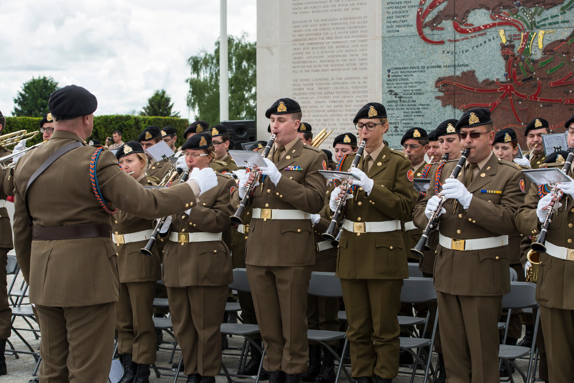 The Luxembourg Musique Militaire performs the Luxembourg and U.S. national anthems during a Memorial Day ceremony at the Luxembourg-American Military Cemetery and Memorial, Luxembourg, May 24, 2014. Memorial Day ceremonies are held throughout Europe to honor service members who fell during world conflicts. (U.S. Air Force photo by Staff Sgt. Christopher Ruano/Released)