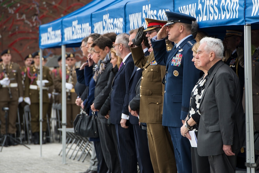 U.S. and Luxembourg dignitaries offer their respects during a Memorial Day ceremony at the Luxembourg-American Military Cemetery and Memorial, Luxembourg, May 24, 2014. Remaining forward, U.S. Air Forces in Europe and Air Forces Africa maintains its readiness to execute NATO commitments and to preserve our allied and partner relationships. (U.S. Air Force photo by Staff Sgt. Christopher Ruano/Released)