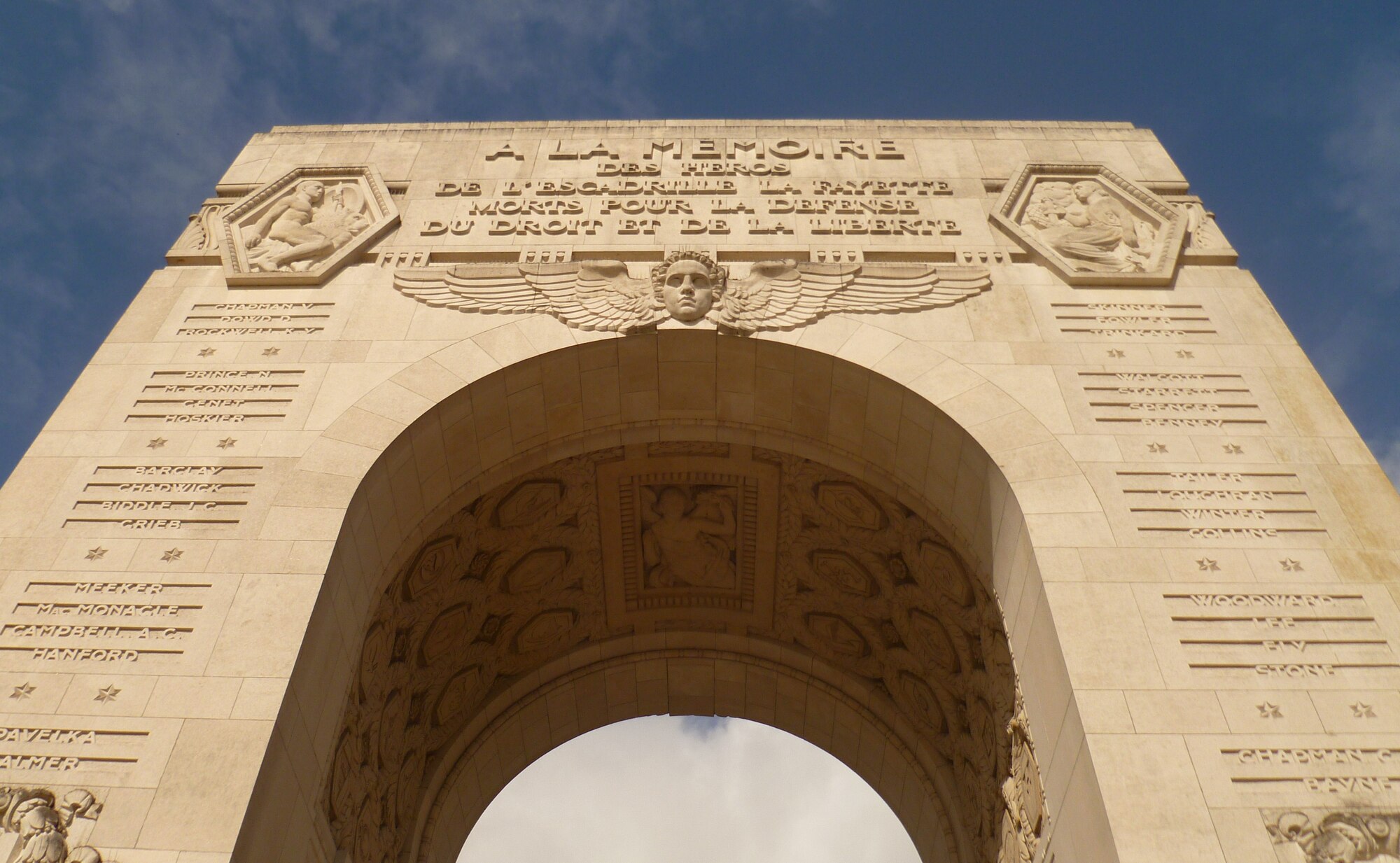 MARNES-LA-COQUETTE, France – Two hundred French and U.S. citizens gathered at the Escadrille Lafayette Memorial just outside Paris for a ceremony May 24, 2014. The Escadrille Lafayette Memorial was erected in 1928 to honor the fallen U.S. volunteer pilots who flew combat missions with the French military in WWI before the United States had officially joined the war. The French inscription above the arch reads, “To the memory of the heroes of the Lafayette Squadron, who died in defense of rights and liberty.” (U.S. Air Force photo/Capt. Reba Good)
