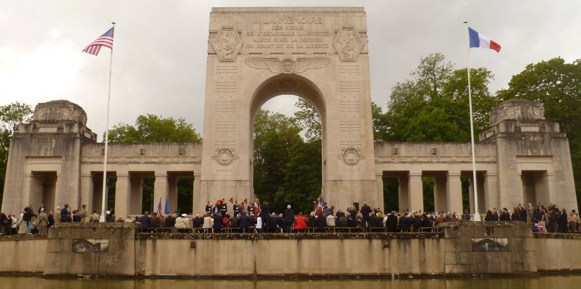 MARNES-LA-COQUETTE, France -- Two hundred French and U.S. citizens gather at the Escadrille Lafayette Memorial just outside Paris for a memorial service, May 24, 2014, honoring the fallen American volunteer pilots who flew combat missions with the French military in WWI. These volunteers created the Escadrille Lafayette, or the Lafayette Squadron, and fought alongside France before and after the United States officially joined the war. (U.S. Air Force photo/Capt. Reba Good)