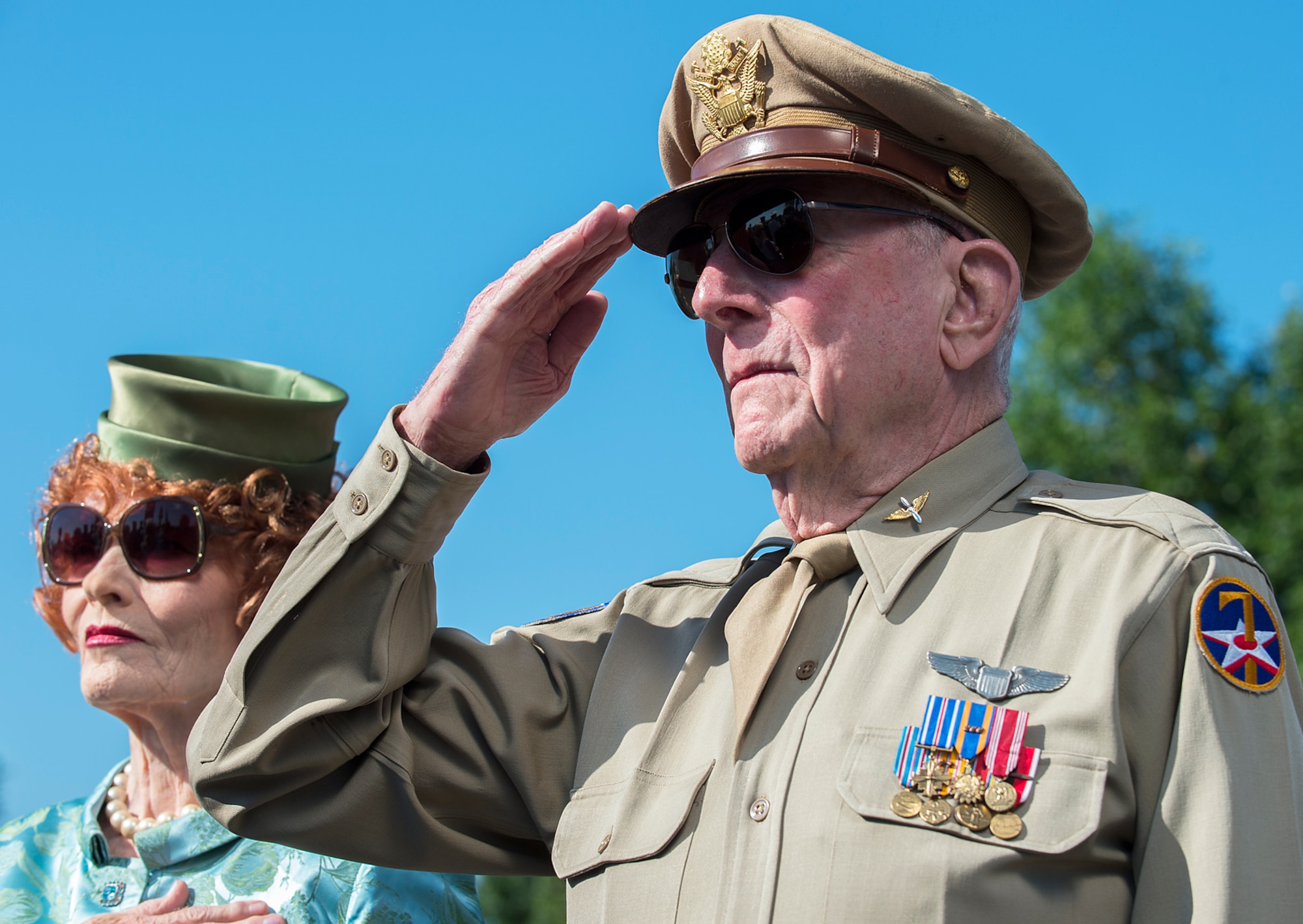 Capt. Jerry Yellin, a World War II P-51 pilot and the national spokeman for the Spirit of 45 Organization renders honors during a Memorial Day wreath-laying ceremony May 26, 2014, at the Air Force Memorial, Arlington, Va. During his keynote address, Chief Master Sgt. of the Air Force James A. Cody urged audience members to remember the fortitude shown by the nation's fallen in fighting and standing their ground. (U.S. Air Force photo/Jim Varhegyi)