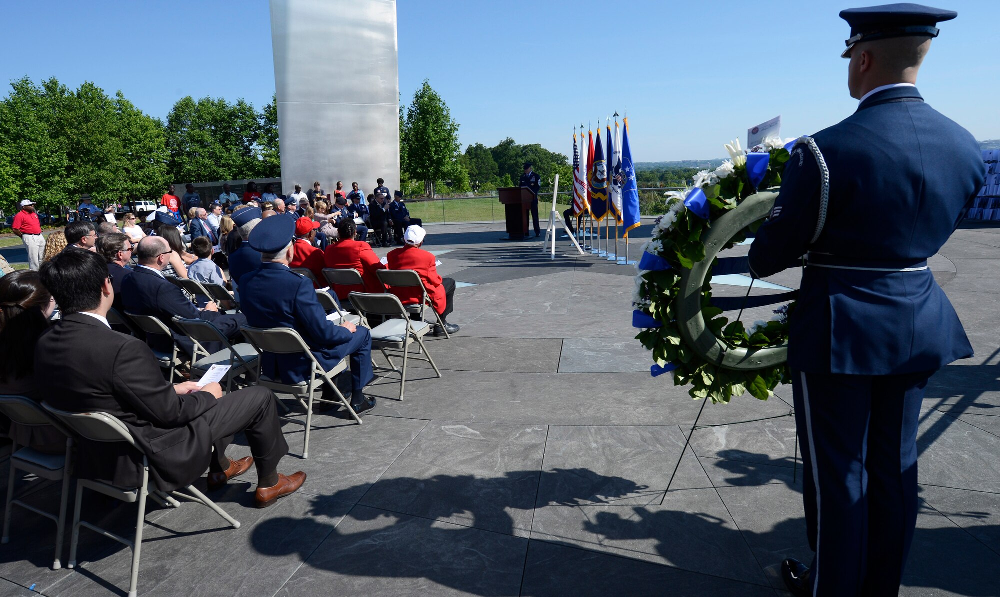 Chief Master Sgt. of the Air Force James A. Cody holds his keynote speech during a Memorial Day wreath-laying ceremony May 26, 2014, at the Air Force Memorial, Arlington, Va. Cody remarked that on Memorial Day the three spires of the memorial remind him of the trifecta of freedom, fortitude and our fallen. Cody said that we all enjoy freedom because of the fortitude shown by of our fallen comrades in fighting and standing their ground. (U.S. Air Force photo/Jim Varhegyi)