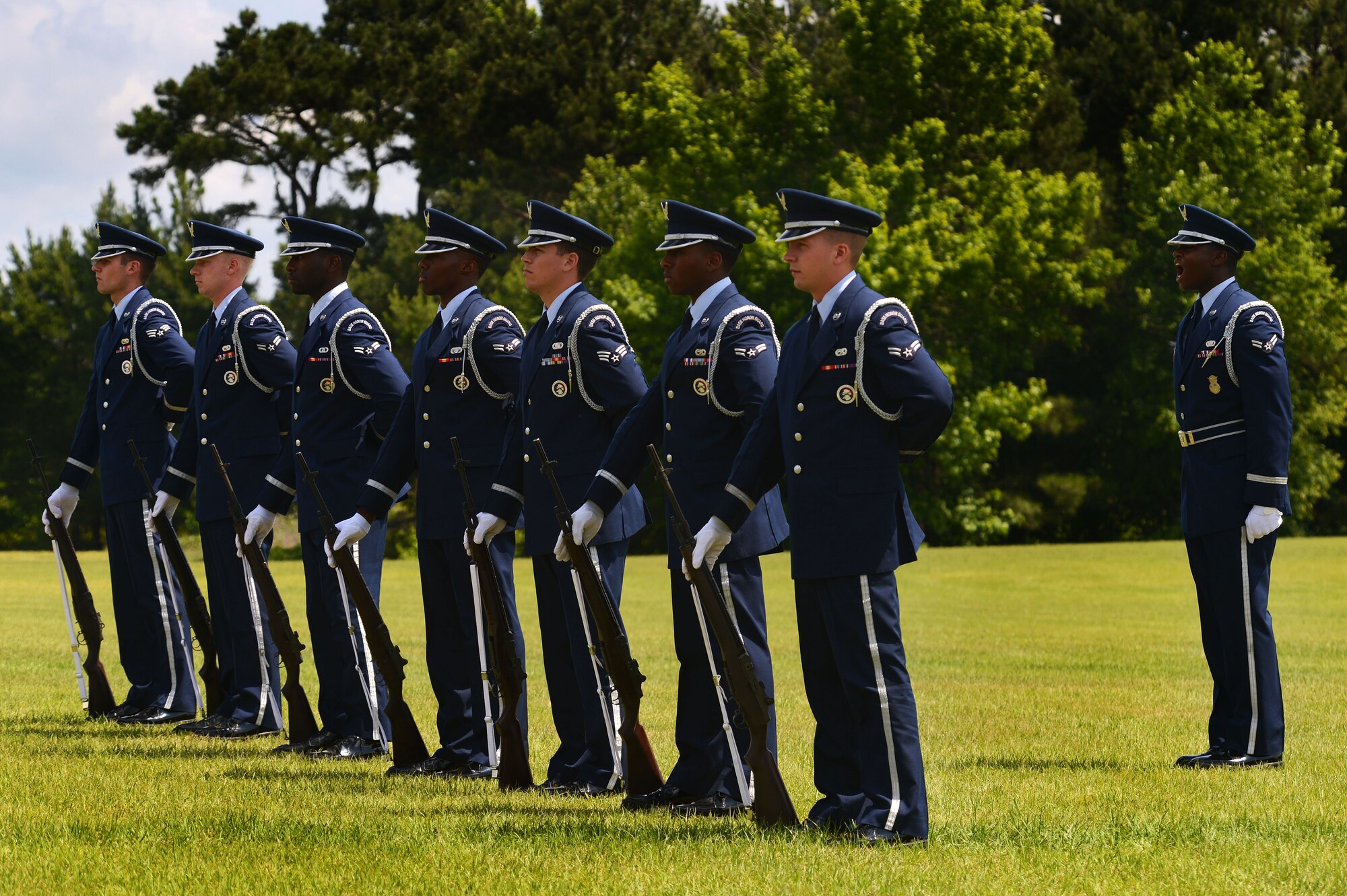U.S. Air Force Honor Guard members from Shaw Air Force Base, prepare to perform a 3-volley rifle salute during a Memorial Day ceremony at Buford Mabry Park, Sumter S.C., May 26, 2014. More than 150 people gathered to remember the men and women of the armed forces who have died in the line of duty. (U.S. Air Force photo by Airman 1st Class Jensen Stidham/Released)