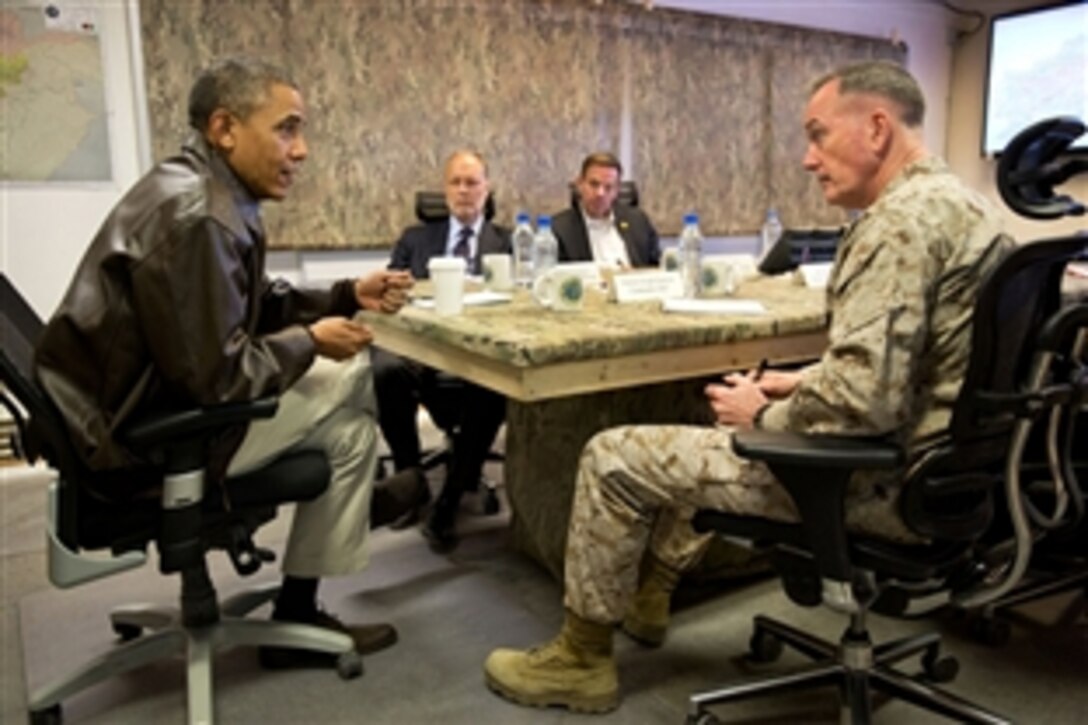 President Barack Obama holds a restricted briefing with U.S. Marine Corps Gen.Joseph F. Dunford Jr., the commander of the International Security Assistance Force and U.S. Forces Afghanistan, and James B. Cunningham, second from left, U.S. ambassador to Afghanistan, at Camp Alpha on Bagram Airfield, Afghanistan, May 25, 2014.