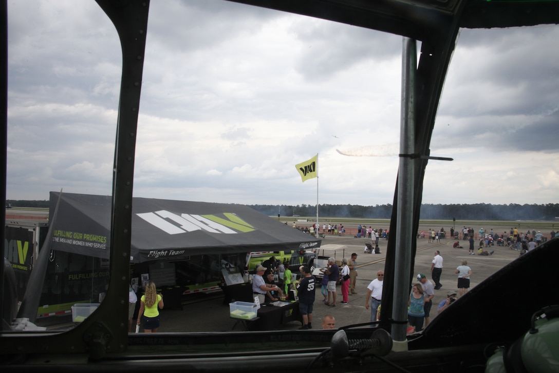 A view from the cockpit of the B-25 Mitchell bomber “Panchito”  shows patrons of the 2014 Marine Corps Air Station Cherry Point Air Show visiting the Disabled American Veterans Flight Team display on the flight line May 18. 