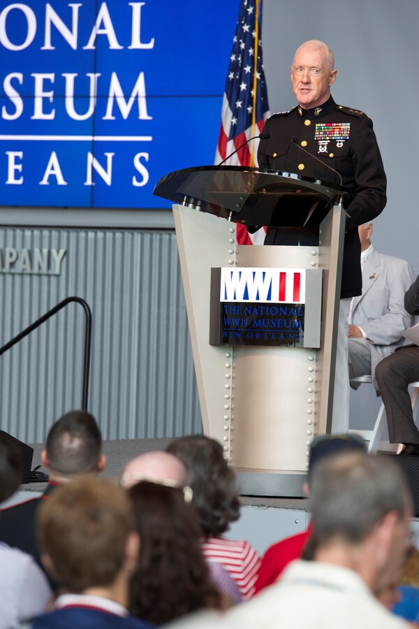 Lieutenant General Richard P. Mills, commander, Marine Forces Reserve, speaks at a memorial service in the Boeing exhibit of the National World War II Museum in New Orleans, Louisiana, May 26, 2014. The ceremony honored members of the military who made the ultimate sacrifice for their country, and was attended by many veterans and family members. 
