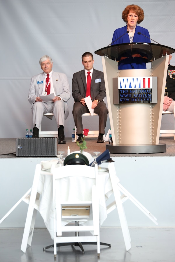 Delora Allison, niece of Gunners Mate First Class James Milton White, who died on the submarine U.S.S. Tang, speaks about the heroism and bravery of military members, at a memorial service in the Boeing exhibit of the National World War II Museum in New Orleans, Louisiana, May 26, 2014. The U.S.S. Tang is the most decorated submarine in U.S. history, which sank on its final voyage while attacking a Japanese convoy and sinking several enemy vessels. The ceremony honored members of the military who made the ultimate sacrifice for their country, and was attended by many veterans and family members.