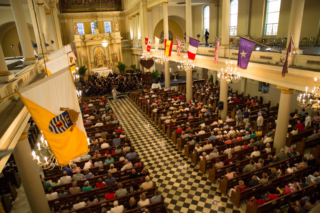Retired Col. Gregg Habel, the executive director of Marine Forces Reserve, gives a welcome speech to the audience during a Memorial Day concert by the Marine Corps Band New Orleans at the St. Louis Cathedral, May 25, 2014. The performance was part of a three-concert series held to remember the fallen men and women who have served in the armed forces. The band also played at the National World War II Museum and the Northshore Harbor Center in Slidell, Louisiana, during their Memorial Day concert series.