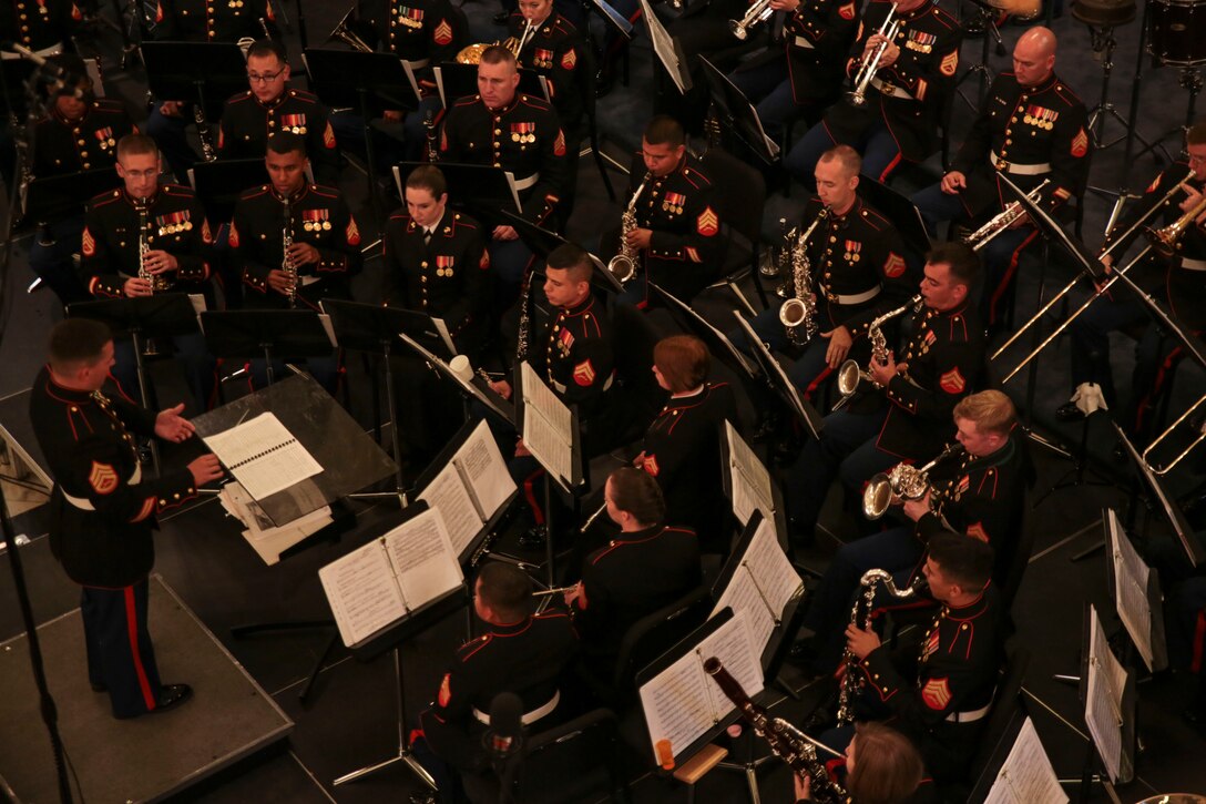 Staff Sgt. Stephen Howell, the assistant enlisted conductor for Marine Corps Band New Orleans, conducts the band during a Memorial Day concert at the St. Louis Cathedral, May 25, 2014. The performance was part of a three-concert series held to remember the fallen men and women who have served in the armed forces. The band also played at the National World War II Museum and the Northshore Harbor Center in Slidell, Louisiana, during their Memorial Day concert series.