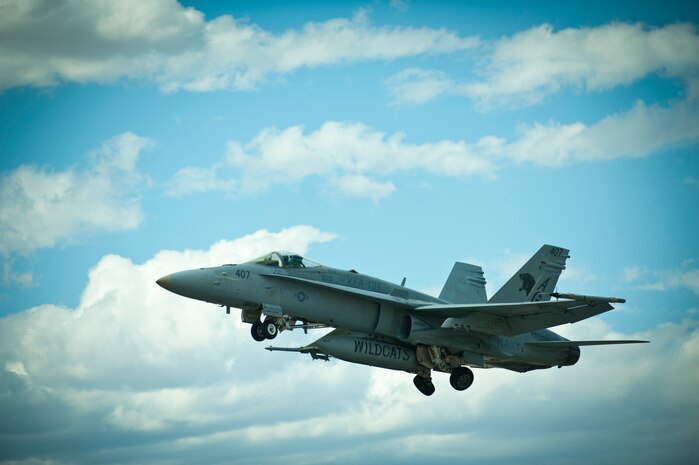 A U.S. Navy F/A-18C Hornet assigned to the Strike Fighter Squadron 131, takes off during Green Flag 14-7 May 21, 2014, at Nellis Air Force Base, Nev. Green Flag exercises provide simulated air-to-ground warfare training for U.S. and allied air and ground crews. (U.S Air Force photo by Airman 1st Class Rachel Loftis)